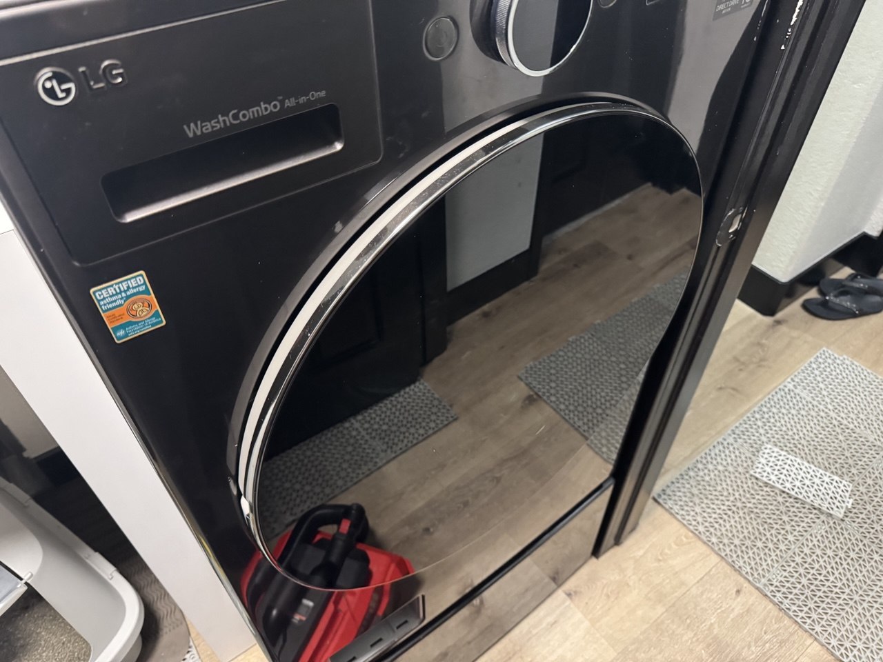 LG WashCombo all-in-one front load washer with the door open